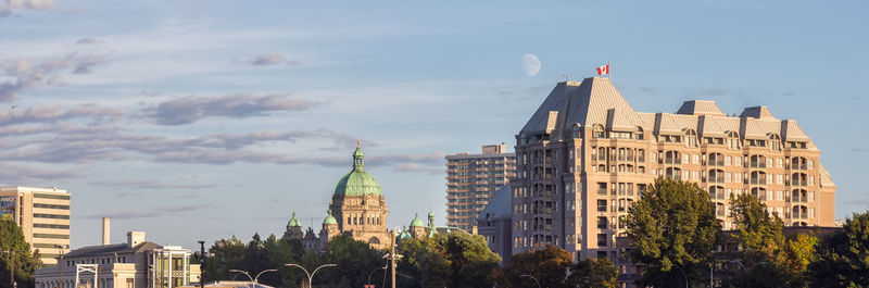 Buildings in city against sky