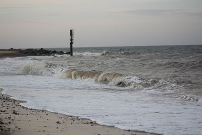 Scenic view of beach against sky