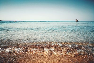 Scenic view of sea against clear sky