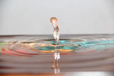 Close-up of drop splashing in water