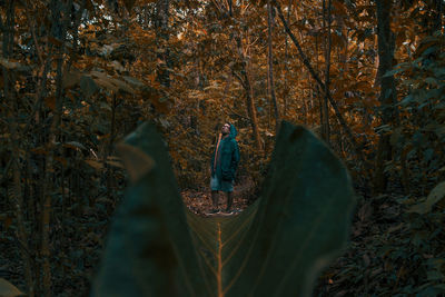 People standing in forest during autumn