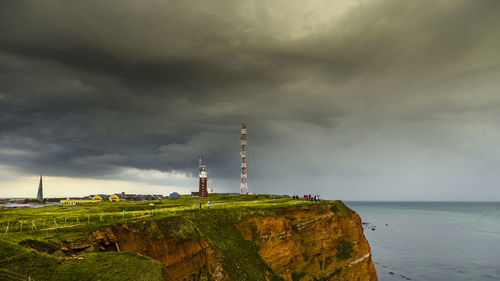 Scenic view of sea against cloudy sky