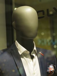 Close-up portrait of man wearing mask