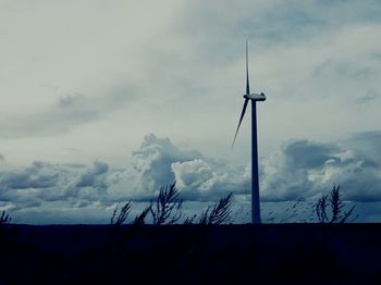 Wind turbines on field