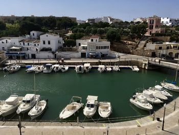 High angle view of boats moored at harbor