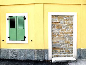 Yellow door of house