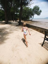 Full length of girl on sand