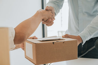 Low angle view of people working in box