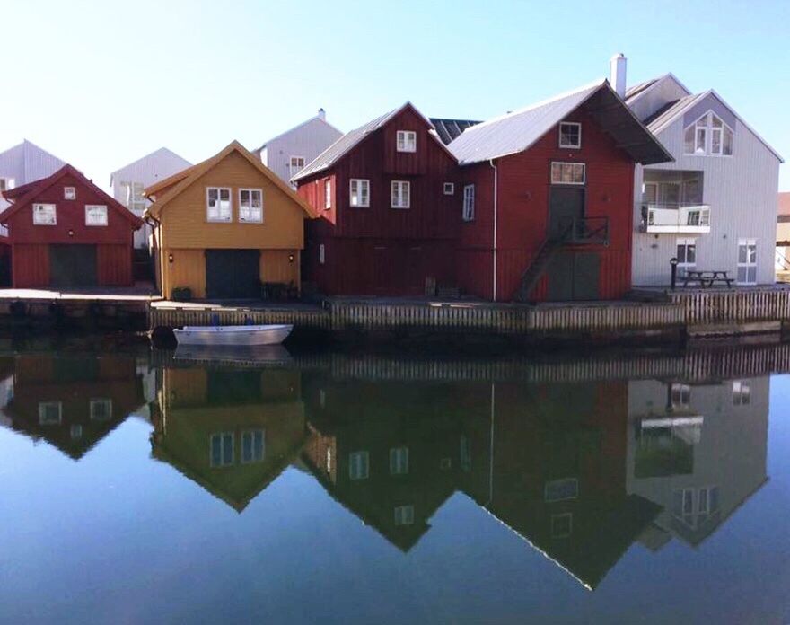 REFLECTION OF HOUSES IN WATER