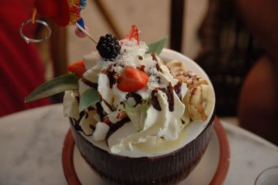 Close-up of ice cream sundae on table