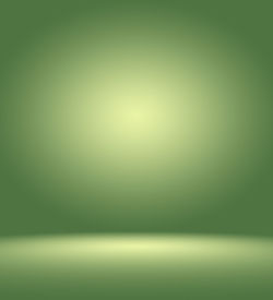 Abstract image of illuminated lights over green background