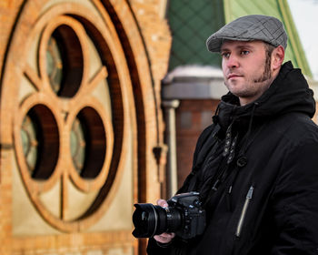 Portrait of man photographing