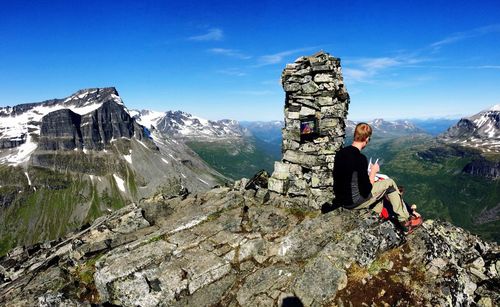 Woman standing on mountain