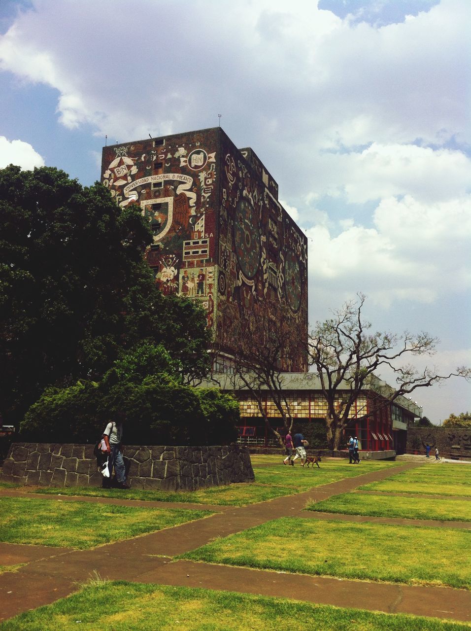 building exterior, architecture, built structure, grass, sky, lawn, tree, cloud - sky, facade, house, cloud, green color, day, outdoors, residential structure, residential building, plant, history, church, building