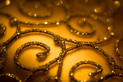 Full frame shot of gold bauble