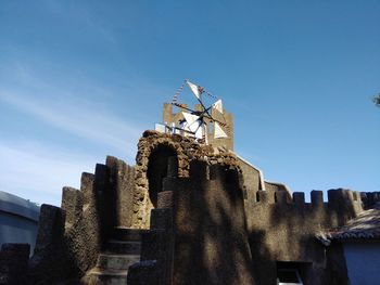 Low angle view of fort against sky