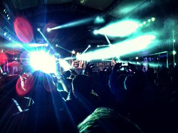 Rear view of people enjoying music concert