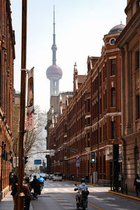 People walking on street in city