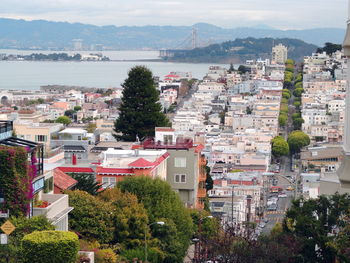 View of cityscape by sea