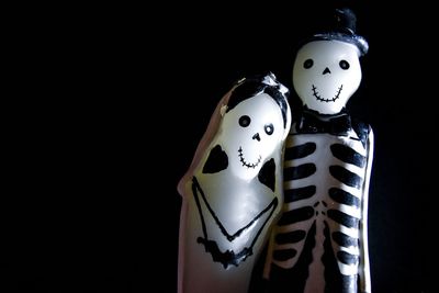 Close-up of stuffed toy against black background