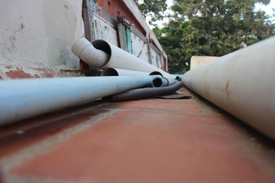 Close-up of pipe on railing