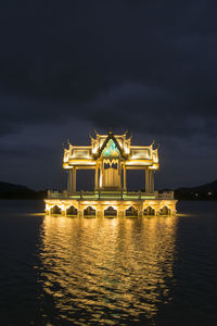 Built structure in water at night