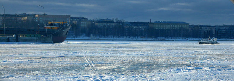 Scenic view of frozen sea against sky