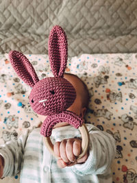 Close-up of hand holding toy