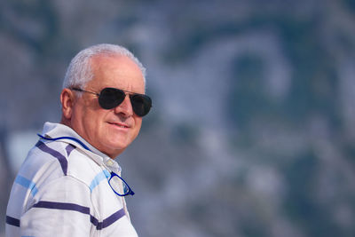 Portrait of man wearing sunglasses outdoors