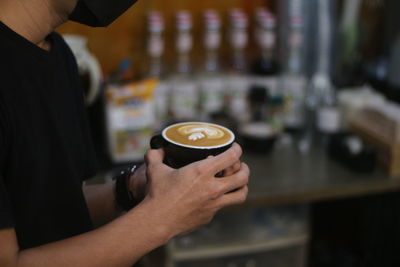 Man holding coffee