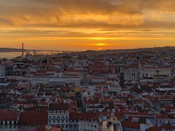 High angle view of townscape against sky during sunset