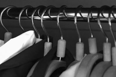 Close-up of clothes hanging on rack