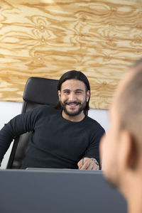 Smiling man in office