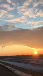 Scenic view of landscape at sunset