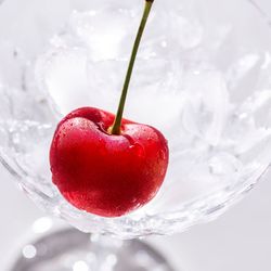 Close-up of strawberry on glass