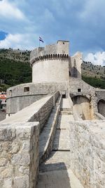 View of fort against cloudy sky