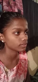 Close-up portrait of smiling girl