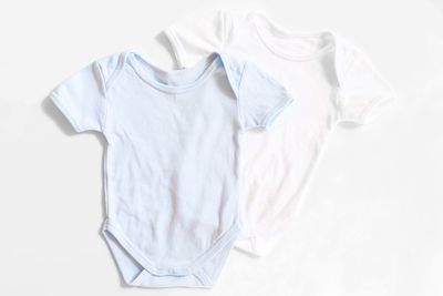 High angle view of mannequin against white background