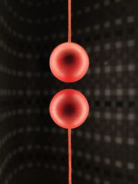 This is an experimental shot of two magnetic red balls