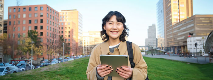 Young woman using mobile phone