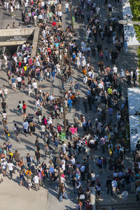 High angle view of people walking on street