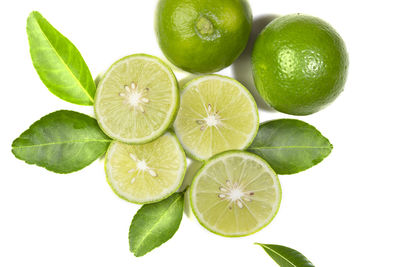 Directly above shot of fruits against white background