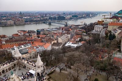 High angle view of crowd in city against sky