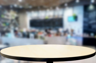 Close-up of illuminated lighting equipment on table