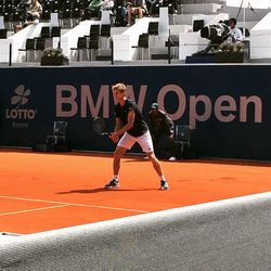 Full length of young man and woman in stadium