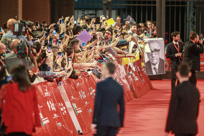 Fans waiting for martin scorsese arrival on red carpet in rome