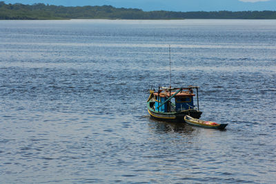 Fishing boat moored in sea