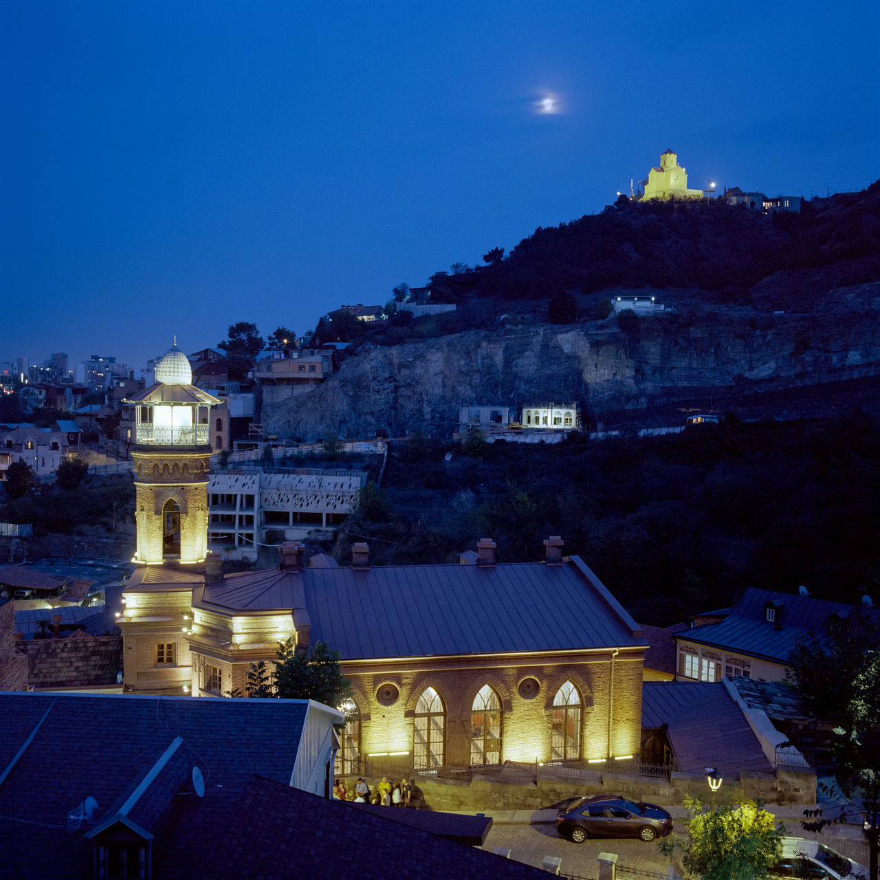 ILLUMINATED BUILDINGS AT NIGHT