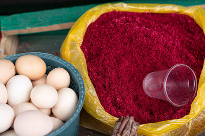 High angle view of eggs in container at market