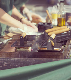 Close-up of preparing food on table